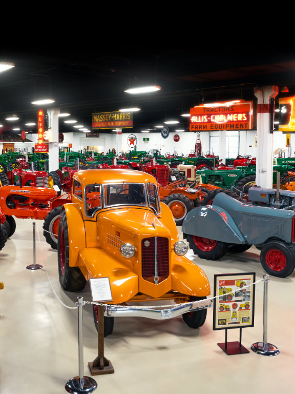 hundreds of antique trucks and tractors on display