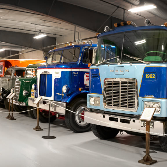 row of classic big rig trucks